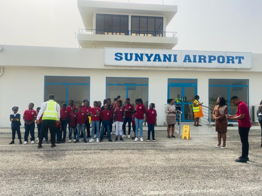 Group activity with club members during the Sunyani Airport tour, showcasing the celebration of aviation.